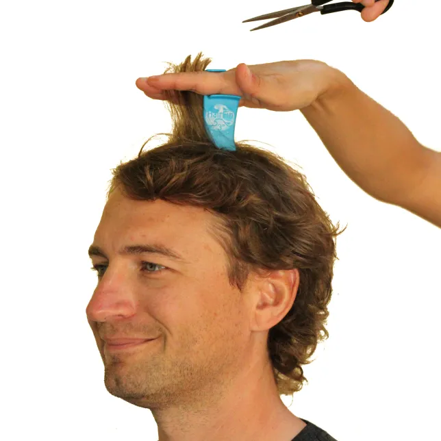 Picture of the inventor getting a HairFin haircut